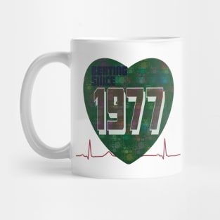 1977 - Beating Since (heart with green drum Kit overlay) Mug